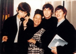 Binny Lum with the Beatles in London, April 1964 Photo by Geoff Charter. Courtesy of Geogg Charter and Sharon Terry Title 1219635